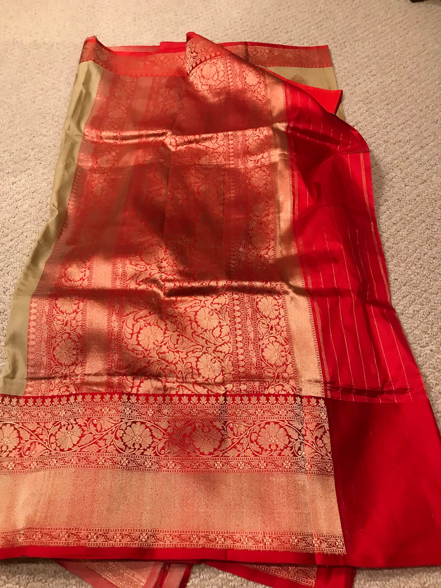 Handwoven Banarasi silk saree with a touch of auspicious Red