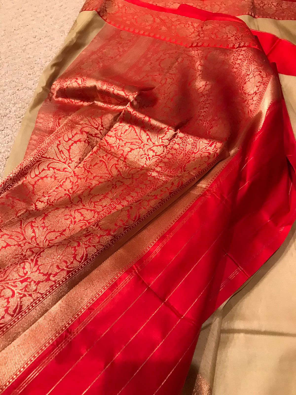 Handwoven Banarasi silk saree with a touch of auspicious Red