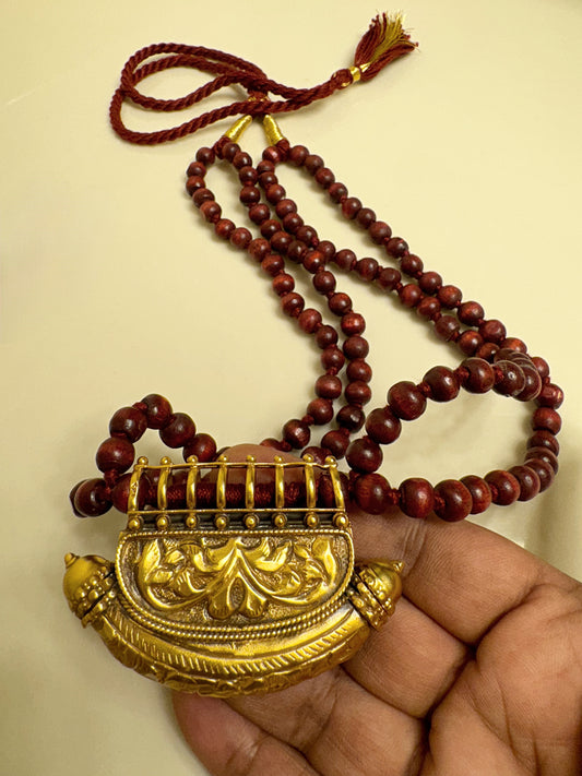 Handcrafted Sterling Silver Boat-Shaped Pendant with Wooden Beads